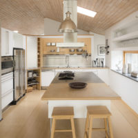 Modern interior of the kitchen-living room of a private house