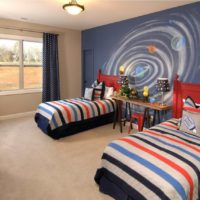 Striped bedspreads in a nursery