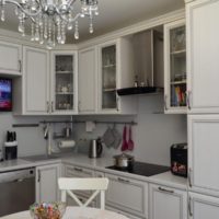 Glass chandelier in the interior of the kitchen