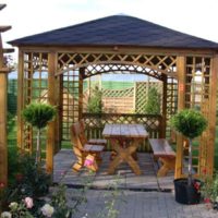 Wooden arbor in the garden landscaping