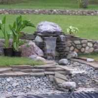 Stone waterfall in the garden