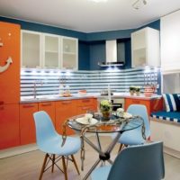 Orange color in the interior of the kitchen