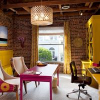 Yellow furniture on brick wall background