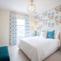 White bed in the bedroom interior of a private house