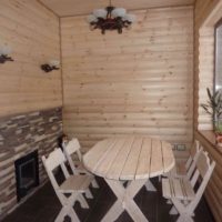 Table of pine boards in the relaxation room in the bath