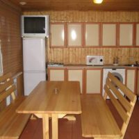 Pine furniture in the relaxation room in the bathhouse