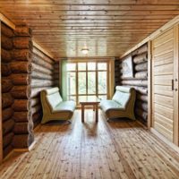 Upholstered furniture in the dressing room of a private bath