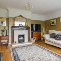 Gray carpet on the living room floor in a private house