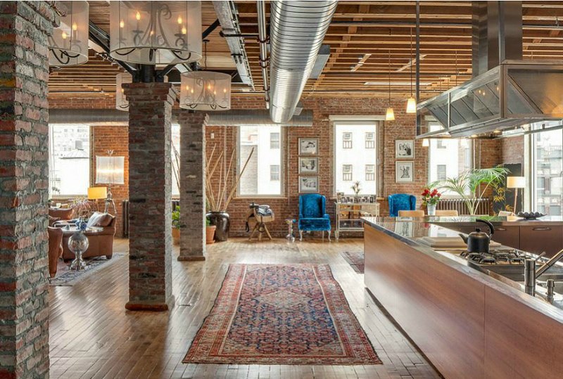 Brick columns in a loft style living room interior