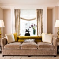 Sofa with velvet upholstery in the living room of a country house