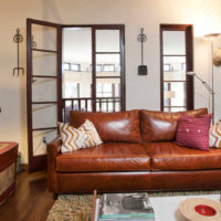 Lights in the living room with a brown sofa