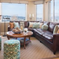 Brown sofa in the interior of a city apartment