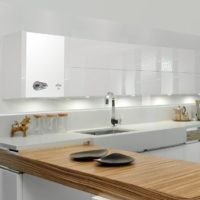 White kitchen interior with gas water heater