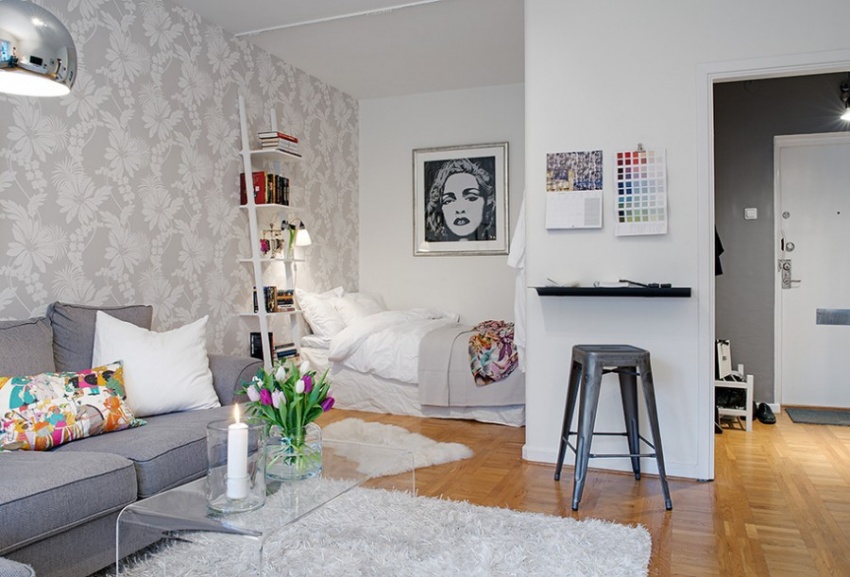 Light atmosphere of comfort in a studio apartment