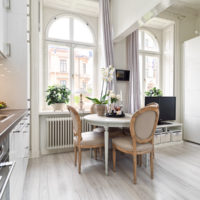 Round Provence-style breakfast table in the kitchen