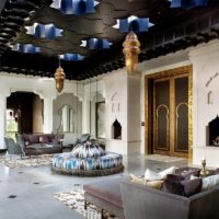 Black ceiling in the interior of the living room of the Moroccan style