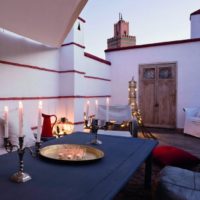 Dining table in the courtyard of a Moroccan house