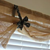 Decoration of the cornice with burlap