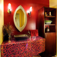 Red mosaic in the interior of the bathroom