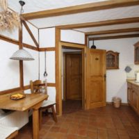 Wooden beams on the wall and ceiling of the living room