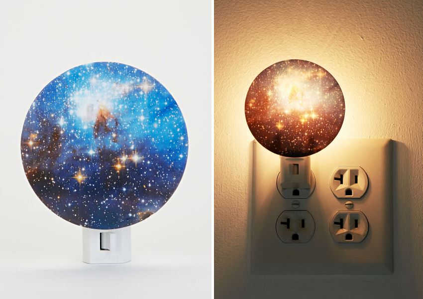 Night lights imitating the starry sky on the walls and ceiling of a room