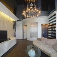 Crystal chandelier on the black ceiling