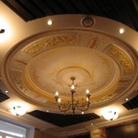 Stucco molding in the design of the ceiling of the hall