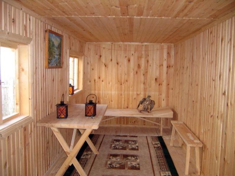 Simple interior of a relaxation room in a small bathhouse