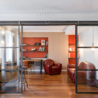 Sliding glass partition on a metal frame