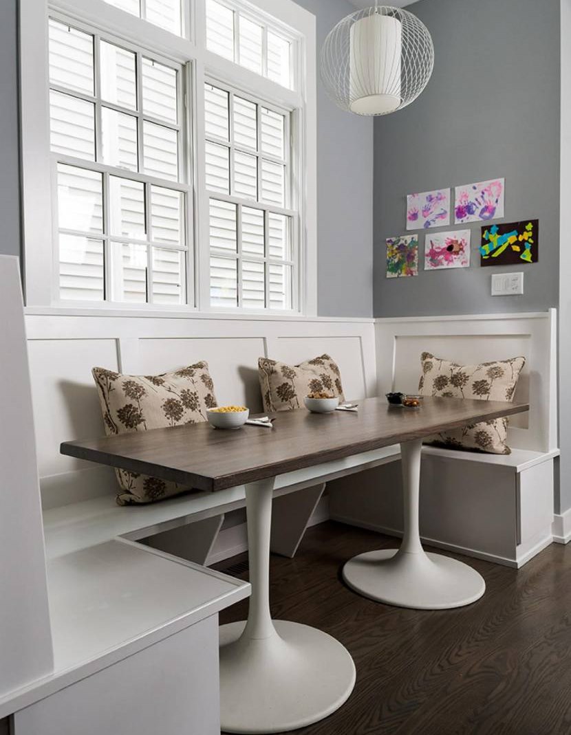 Retro style dining area design with modern table.