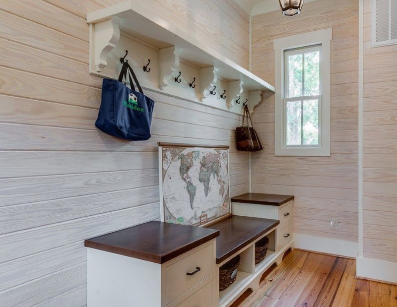 Wall decoration of a small hallway with a clarified clapboard