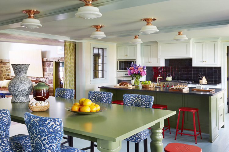 Bright chairs with backs at the dining table in the kitchen-living room