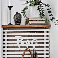 Wooden shelf above the radiator