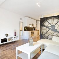 Brown floor in a white apartment