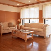 Brown tiled living room with glossy floor