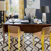 Stylish chairs with yellow legs