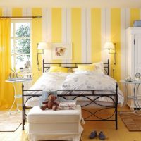 Striped wallpaper in the bedroom interior