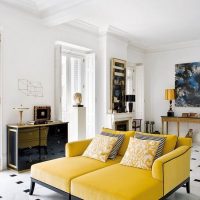 Black chest of drawers in a white living room