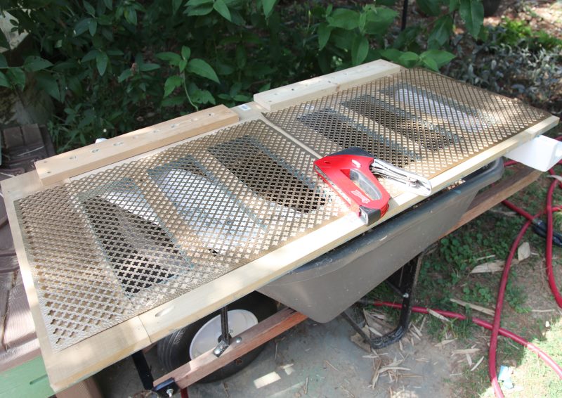 Securing the perforated panel to the screen frame for the radiator