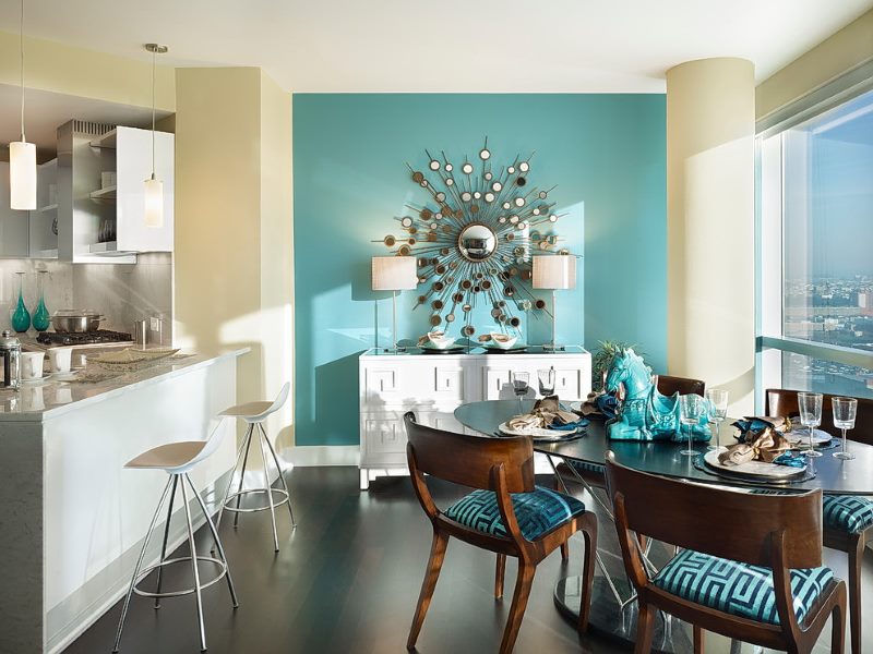 Brown oval shaped dining table in an Art Deco kitchen