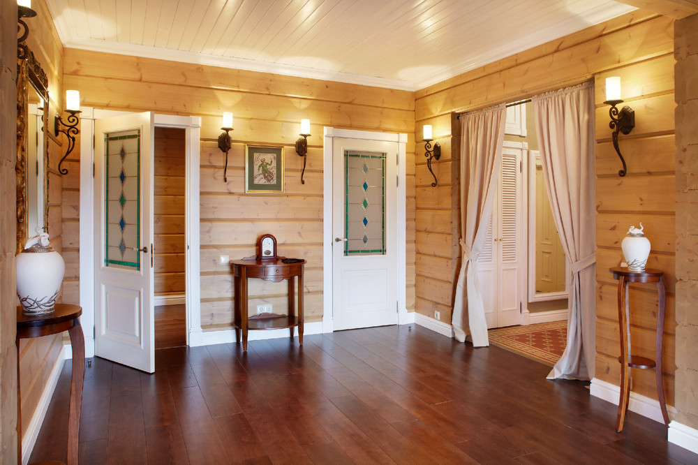 The interior of the hallway of the house from glued beams