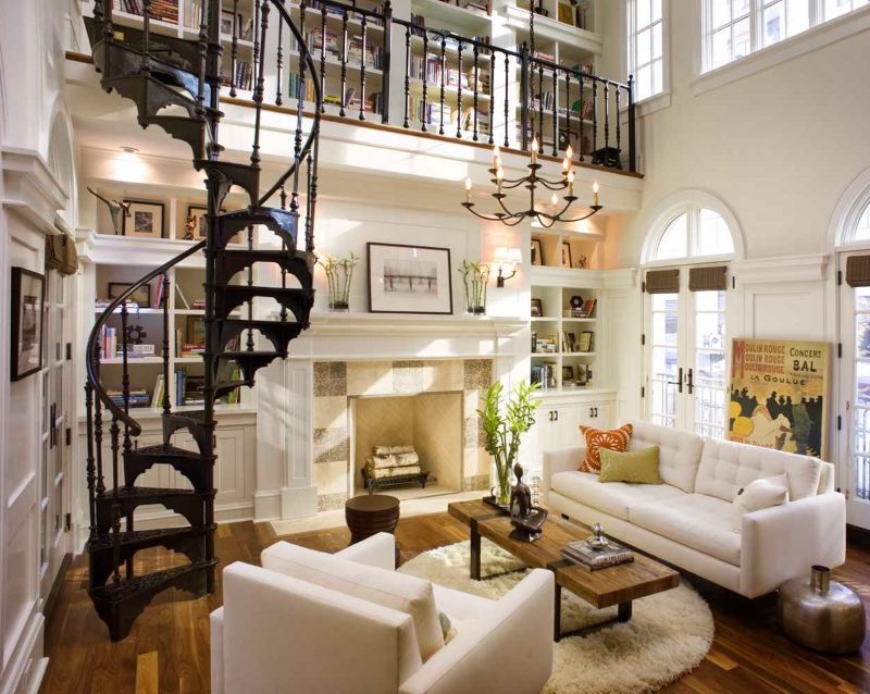 Black spiral staircase in the interior of a townhouse