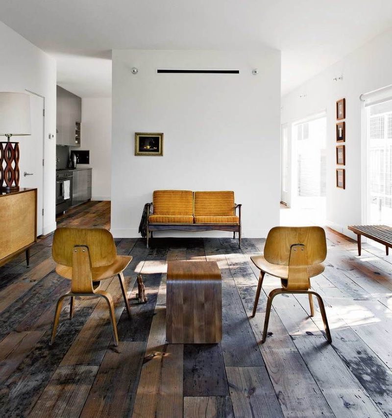 White walls in the living room with plank floor