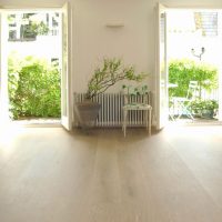 Living room of a private house with doors to the garden