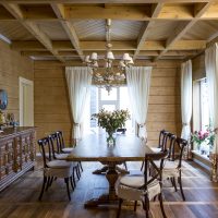 The interior of the dining room in the house of timber