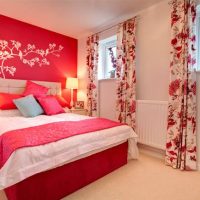 Red color in the design of the bedroom