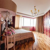 Design a modern bedroom with two types of wallpaper