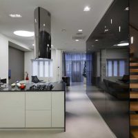 Wooden staircase behind a glass partition