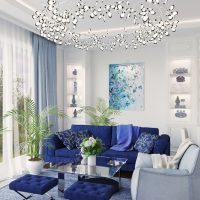 Sofa biru di dalam bilik putih