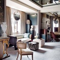 Mirrored ceiling in the living room of a city apartment